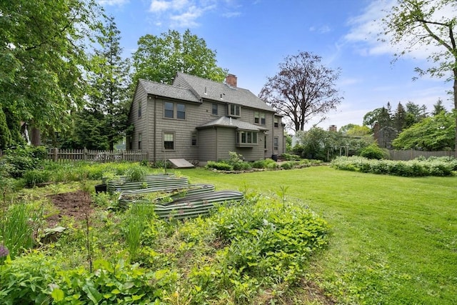 20 Johnson Rd, Andover, MA 01810 - back of property with a chimney and roof with shingles