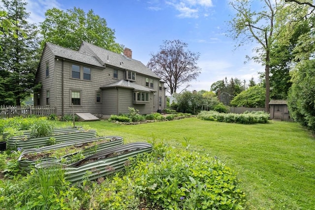 20 Johnson Rd, Andover, MA 01810 - back of house with a chimney and a shingled roof