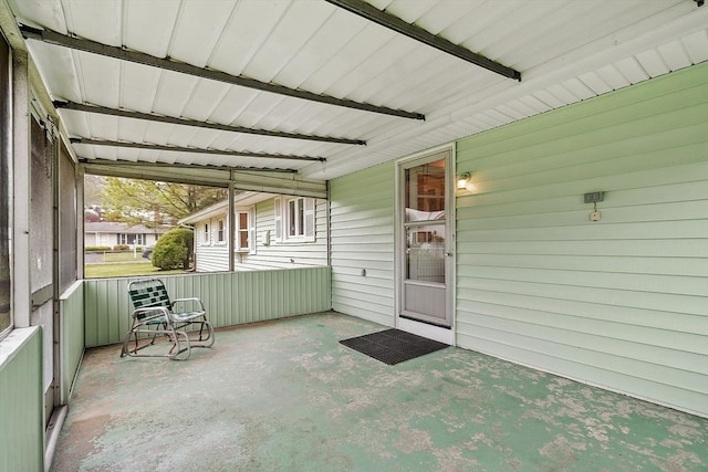 sunroom / solarium featuring radiator