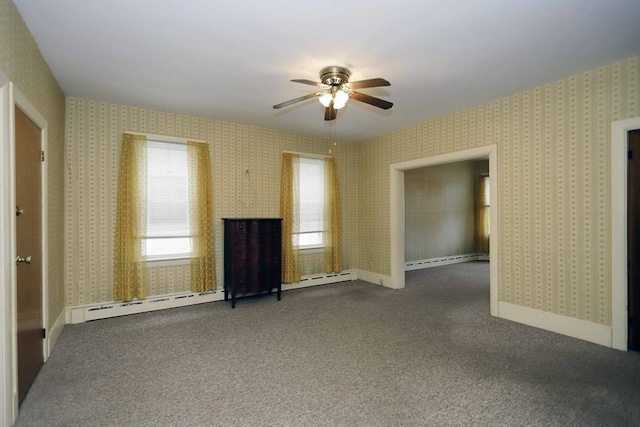 unfurnished living room with baseboard heating, ceiling fan, and carpet flooring