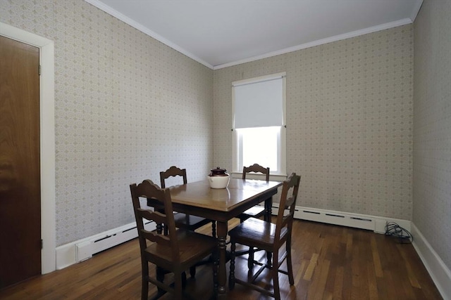 dining space featuring crown molding, dark hardwood / wood-style flooring, and baseboard heating