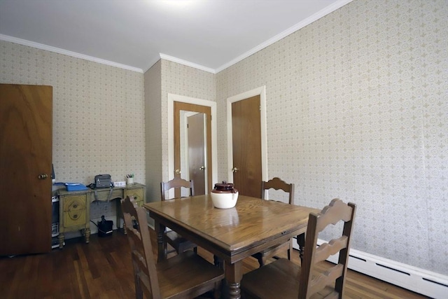 dining room with crown molding, dark hardwood / wood-style floors, and a baseboard heating unit