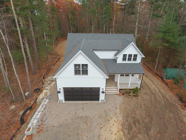 view of front of house featuring a garage and covered porch