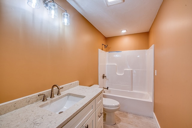 full bathroom featuring tile patterned flooring, vanity, bathing tub / shower combination, and toilet