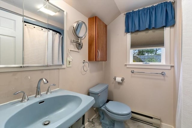full bath with a baseboard heating unit, a sink, toilet, vaulted ceiling, and curtained shower