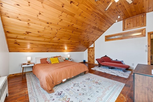 bedroom with hardwood / wood-style floors, radiator, baseboards, wood ceiling, and vaulted ceiling