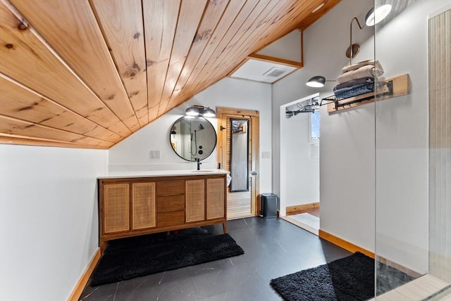 full bath featuring vanity, vaulted ceiling, wood ceiling, and baseboards