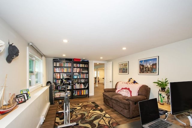 215 Alida Rd, Braintree, MA 02184 - living area featuring wood finished floors, recessed lighting, and a baseboard radiator