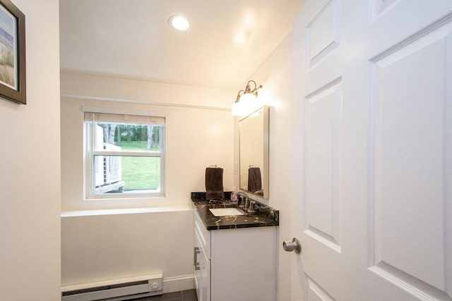 215 Alida Rd, Braintree, MA 02184 - bathroom with baseboard heating, vanity, and recessed lighting