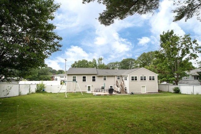 215 Alida Rd, Braintree, MA 02184 - rear view of house with a fenced backyard and a patio area
