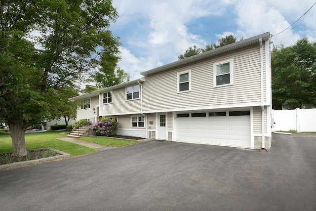 215 Alida Rd, Braintree, MA 02184 - raised ranch with driveway and a garage