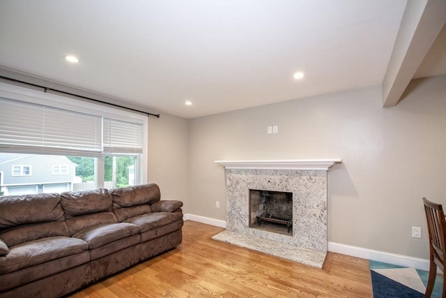 215 Alida Rd, Braintree, MA 02184 - living room featuring light wood-style flooring, a fireplace, and recessed lighting