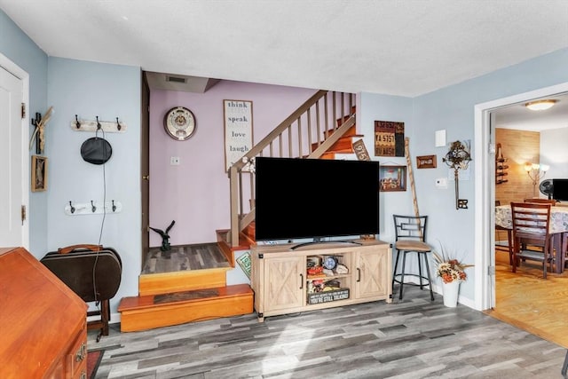 living room with wood-type flooring