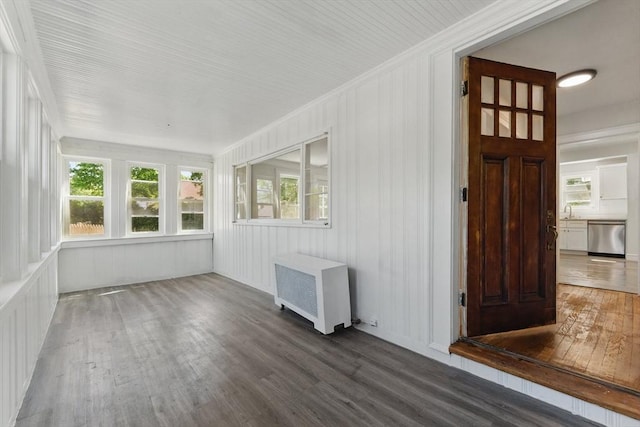 515 Front St, Weymouth, MA 02188 - unfurnished sunroom with radiator heating unit