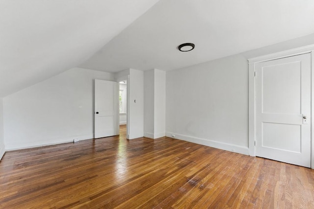 515 Front St, Weymouth, MA 02188 - additional living space with lofted ceiling, wood-type flooring, and baseboards