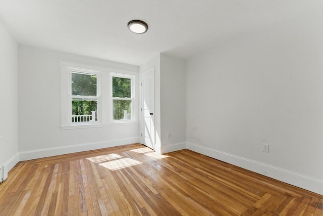 515 Front St, Weymouth, MA 02188 - unfurnished room with baseboards and light wood-style flooring