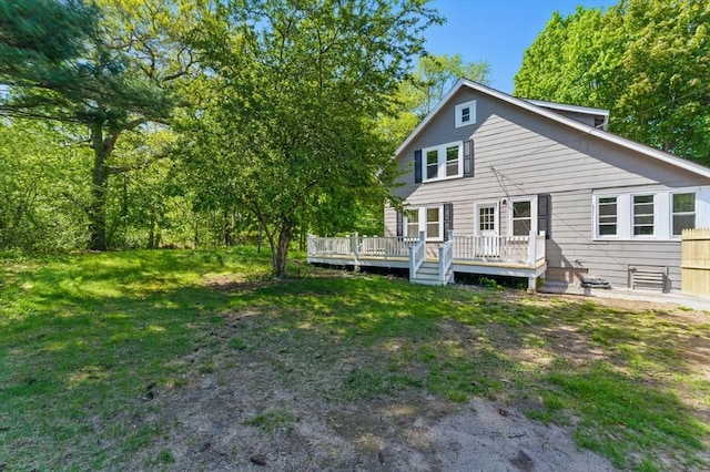 515 Front St, Weymouth, MA 02188 - rear view of property with a wooden deck and a lawn