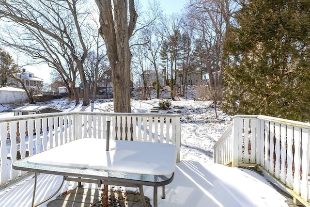 view of snow covered deck