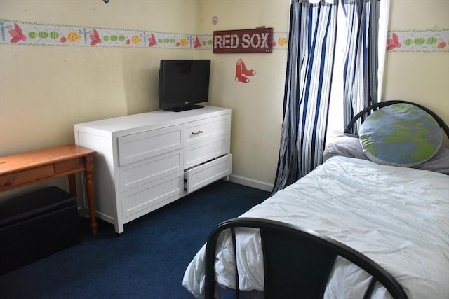 bedroom with dark carpet