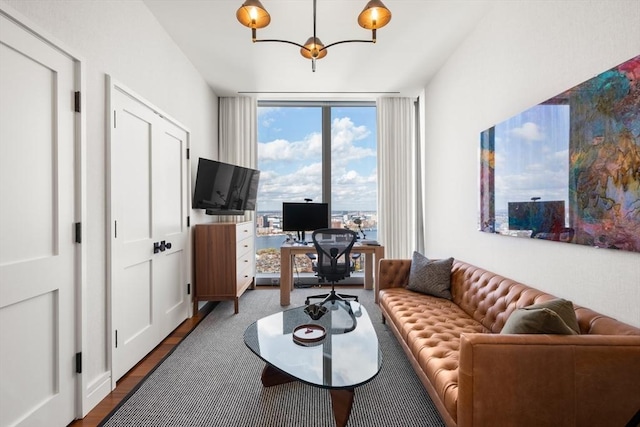 living room with floor to ceiling windows and hardwood / wood-style floors