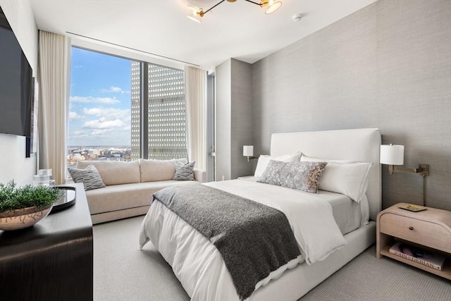 bedroom with expansive windows