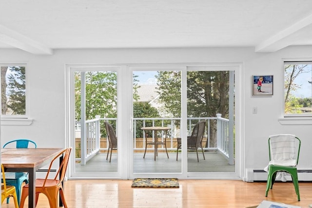 2 Cushing Lndg, Scituate, MA 02066 - doorway featuring wood finished floors and baseboard heating