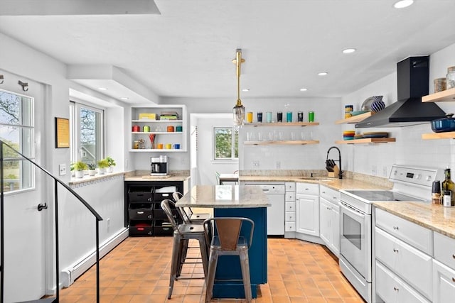 2 Cushing Lndg, Scituate, MA 02066 - kitchen with open shelves, white appliances, a sink, wall chimney range hood, and decorative backsplash