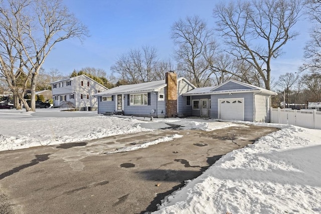 view of front of property featuring a garage