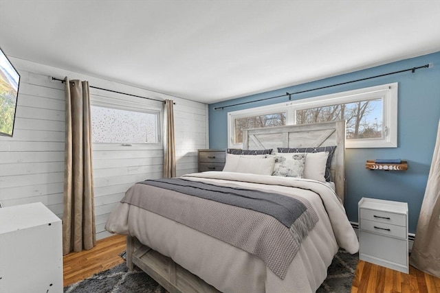 bedroom featuring wood-type flooring