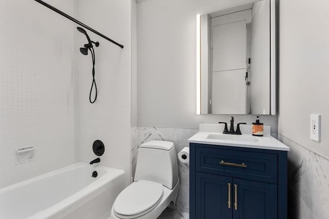 86 Myles Standish Rd, Weston, MA 02493 - bathroom with tile walls, vanity, toilet, shower / bathtub combination, and wainscoting