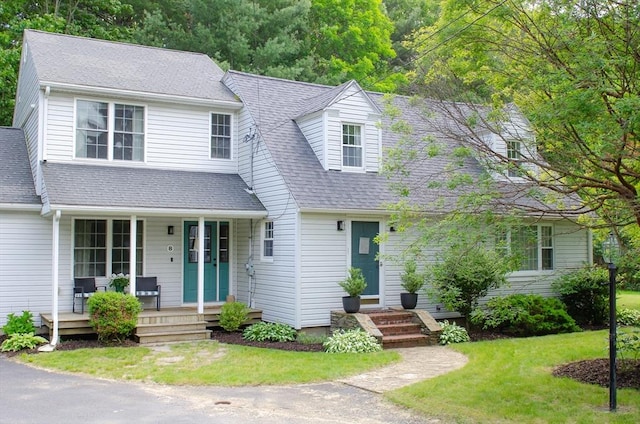 8 Dudley Rd, Sutton, MA 01590 - view of front of house with a porch, a front lawn, and a shingled roof