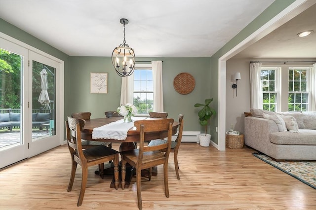 8 Dudley Rd, Sutton, MA 01590 - dining room with a chandelier, light wood-style flooring, a baseboard heating unit, and baseboards