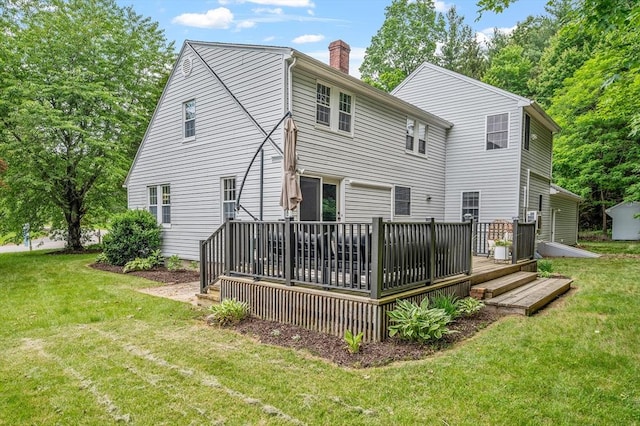 8 Dudley Rd, Sutton, MA 01590 - back of property with a chimney, a wooden deck, and a yard