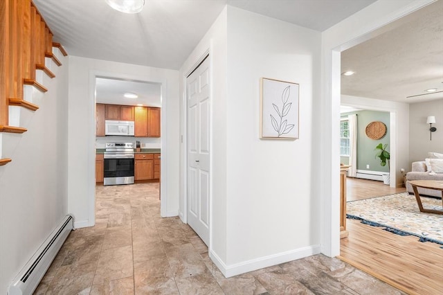 8 Dudley Rd, Sutton, MA 01590 - corridor featuring a baseboard heating unit, baseboards, stone finish flooring, and recessed lighting