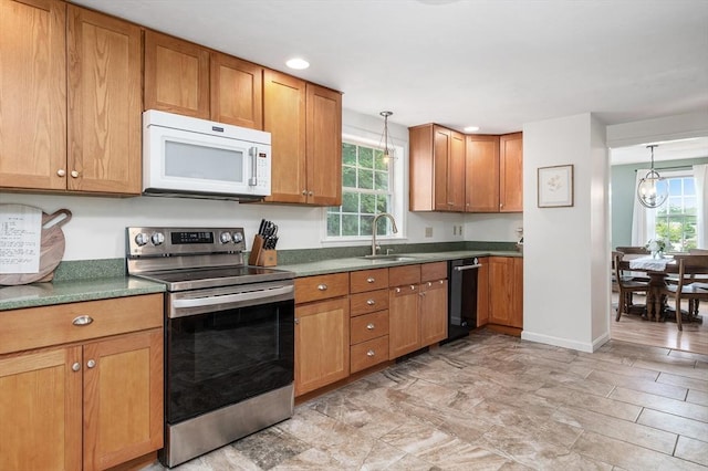 8 Dudley Rd, Sutton, MA 01590 - kitchen featuring white microwave, stainless steel range with electric stovetop, a sink, plenty of natural light, and recessed lighting