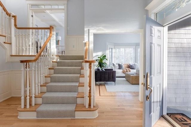 stairs with wood-type flooring