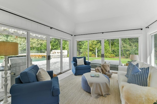 sunroom with vaulted ceiling