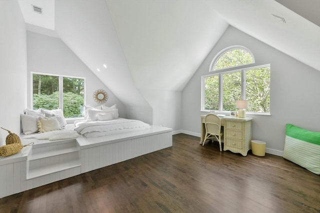 bedroom with dark hardwood / wood-style flooring