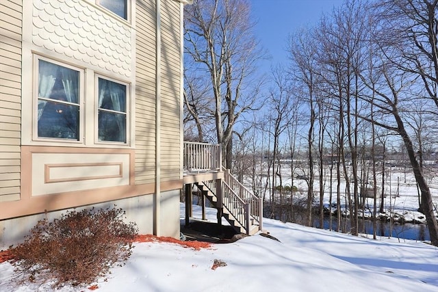 view of yard layered in snow