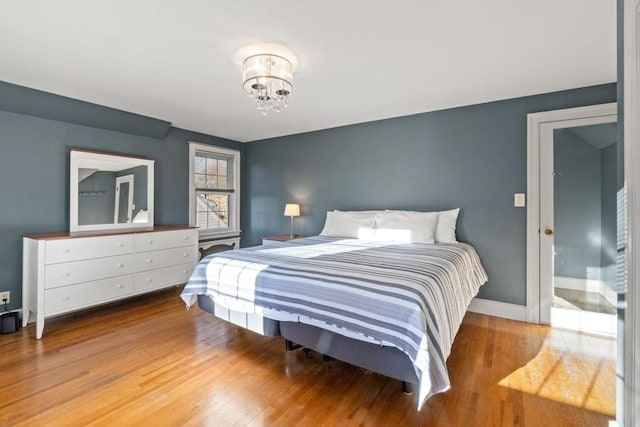 bedroom with light wood-type flooring