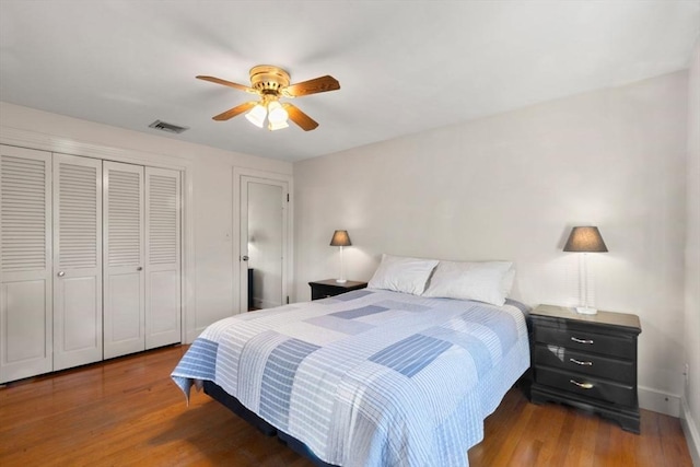 bedroom featuring ceiling fan and wood-type flooring