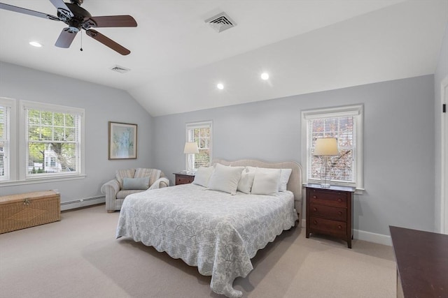 bedroom with light colored carpet, a baseboard heating unit, vaulted ceiling, and multiple windows