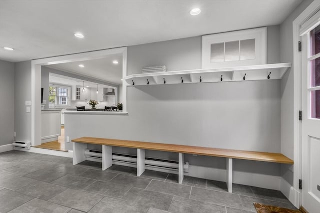 mudroom featuring baseboards, recessed lighting, and a baseboard radiator