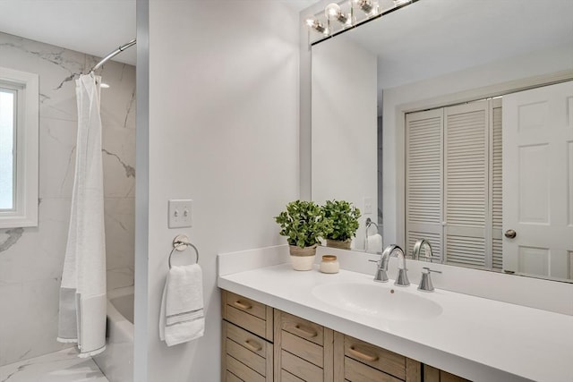 bathroom with vanity and shower / bath combination with curtain