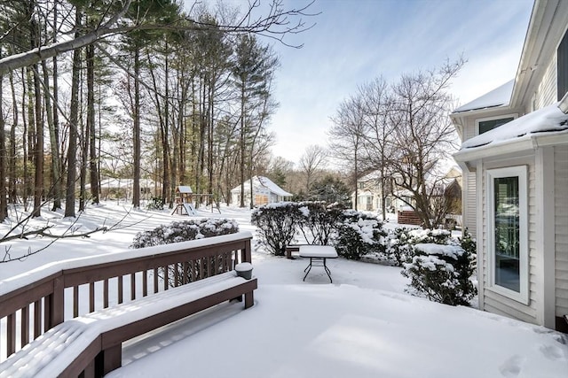 view of snow covered deck