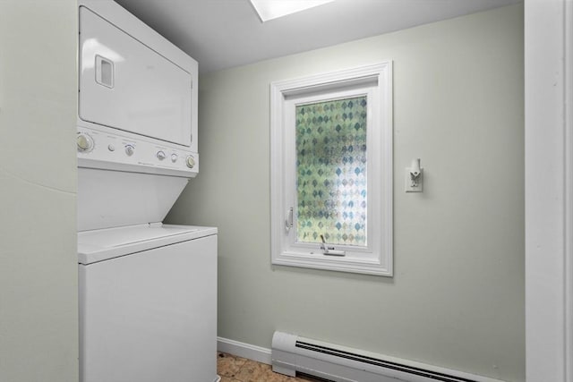12 Day St, Fairhaven, MA 02719 - laundry area featuring stacked washer / drying machine and a baseboard heating unit