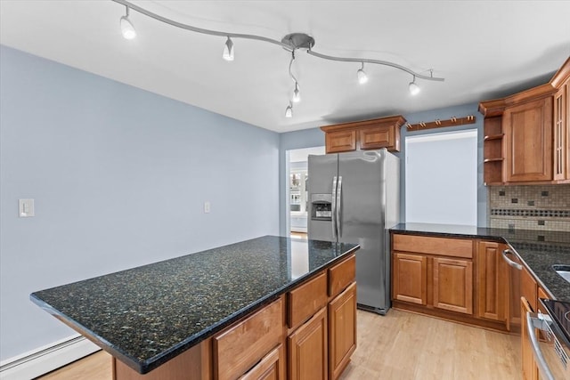 kitchen featuring open shelves, stainless steel appliances, backsplash, light wood-style flooring, and a baseboard heating unit