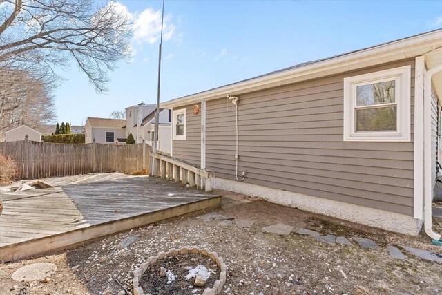 wooden deck featuring fence