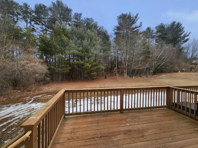 wooden deck featuring a water view