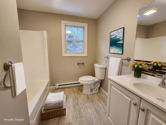 full bathroom with a baseboard radiator, baseboards, vanity, and toilet